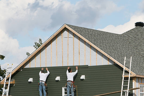 Professional Siding Installation technician working in Winchester, OH
